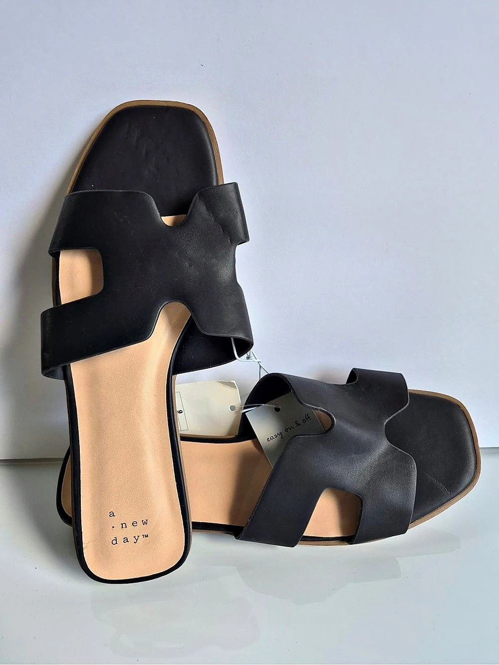 A. New day Slide Sandals in Black & Tan Like New